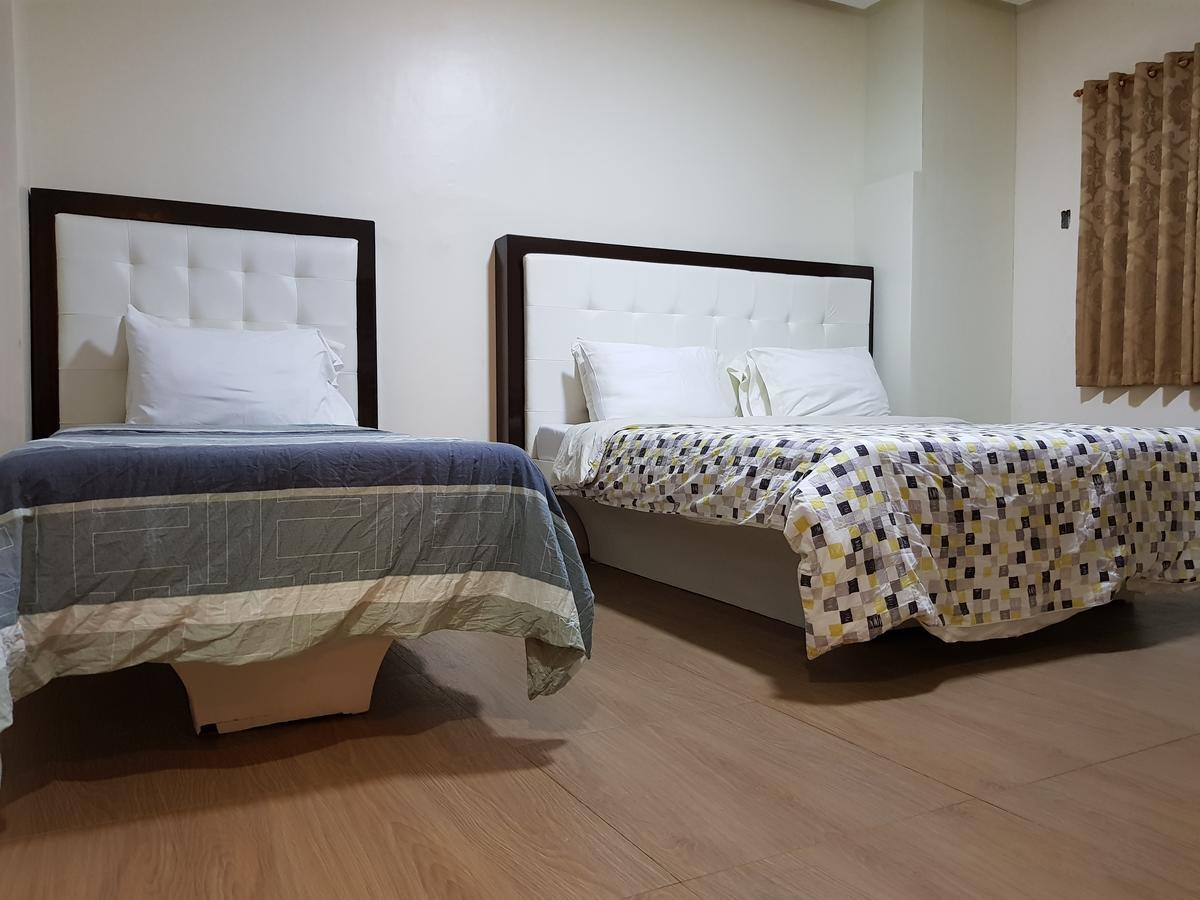 Hotel Giorgio General Santos City Bagian luar foto