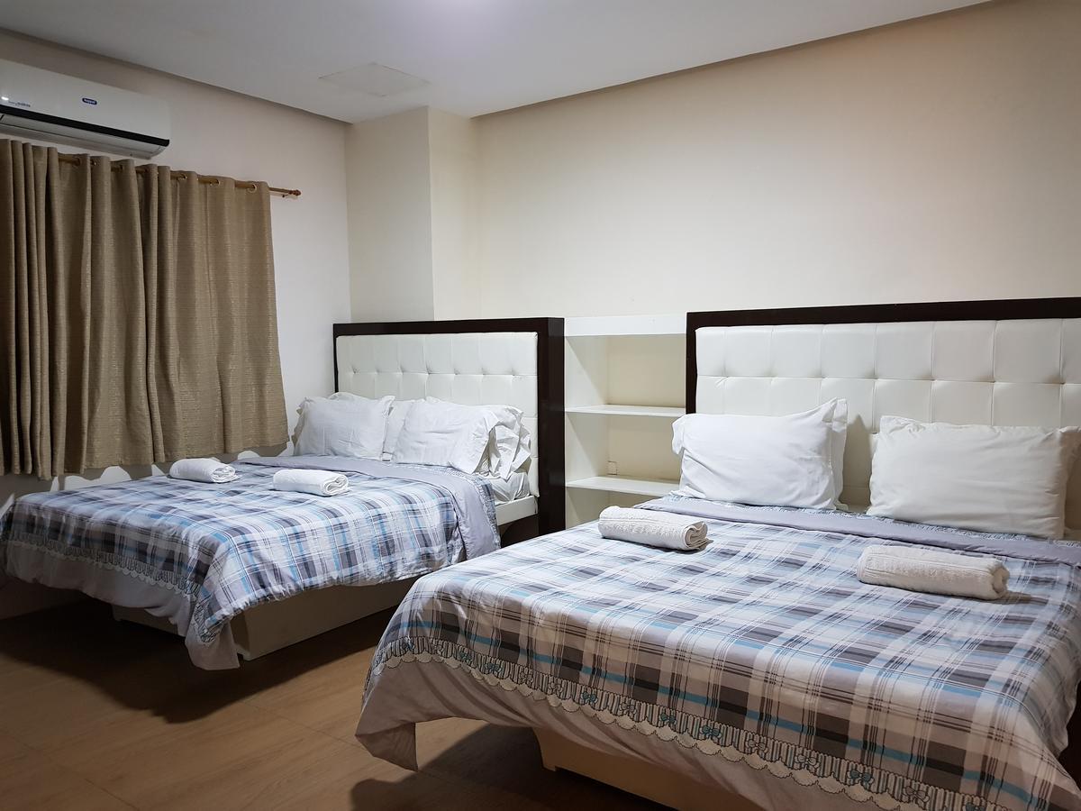 Hotel Giorgio General Santos City Bagian luar foto